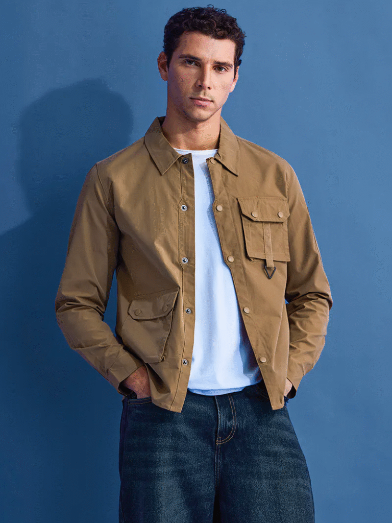 Multi-pocket construction and technical fabrics for functional street fashion.