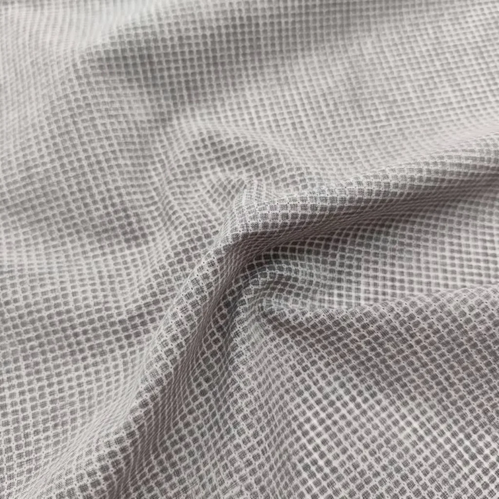 Dual-layer fabric balancing durability and breathability for hybrid outerwear.