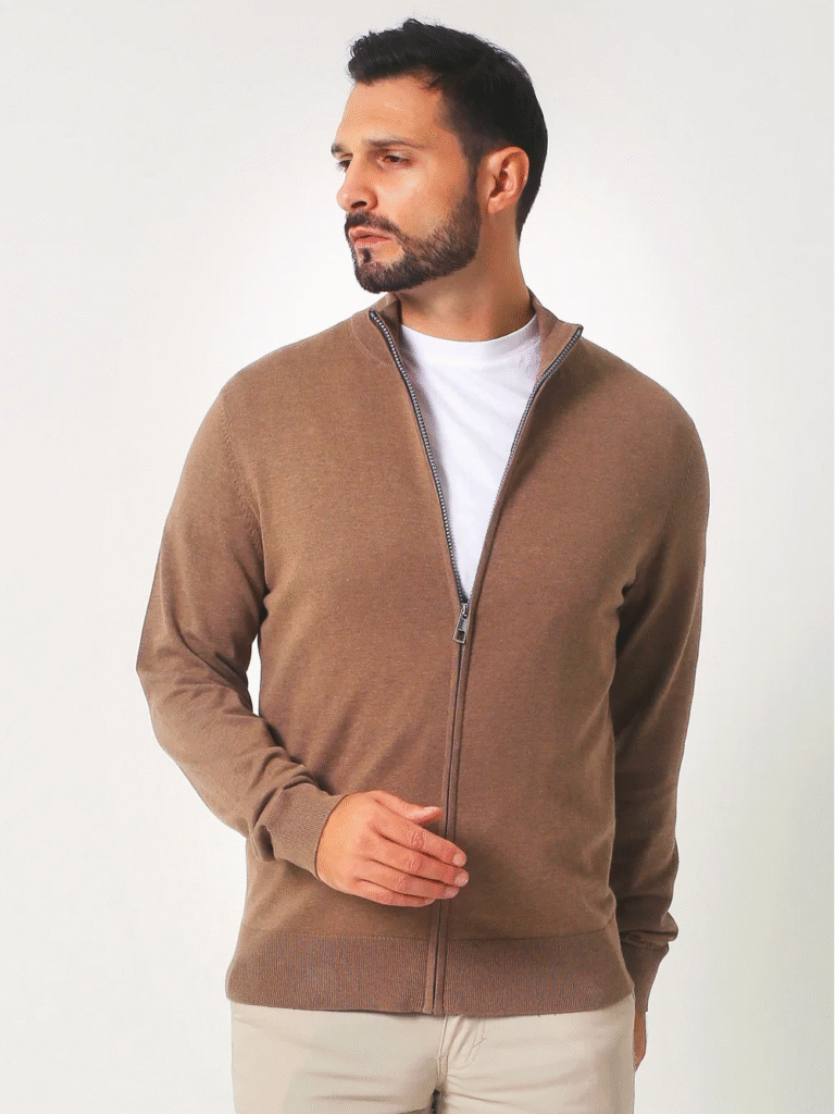 Contemporary half-zip or full-zip design with ribbed cuffs and adjustable collars, blending function and streetwear aesthetics.