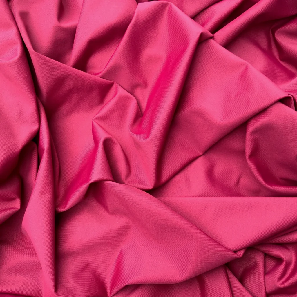 Recycled nylon made from ocean waste, ideal for sustainable outerwear and active street collections.
