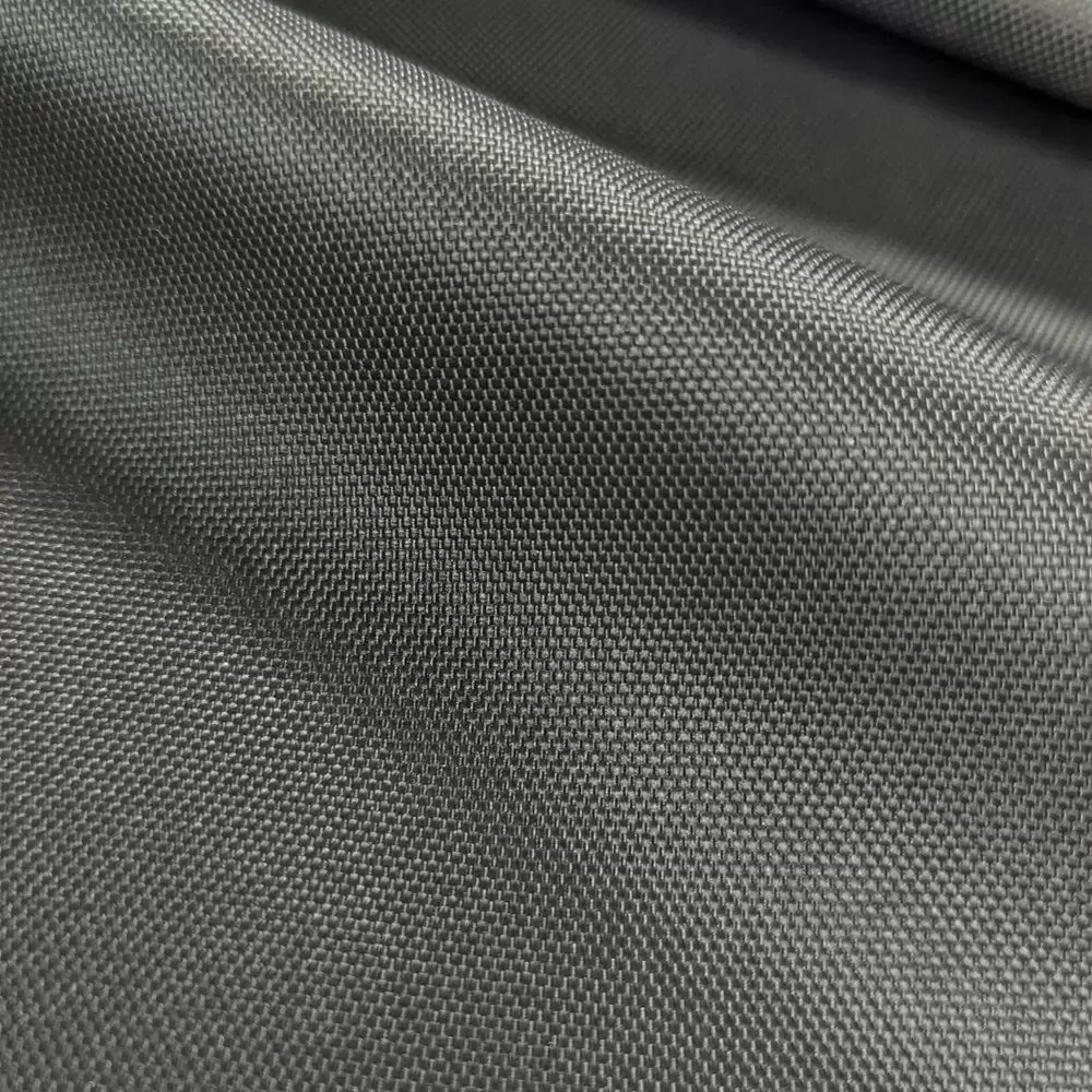 Gloss or matte coated fabric providing waterproof protection and street edge.