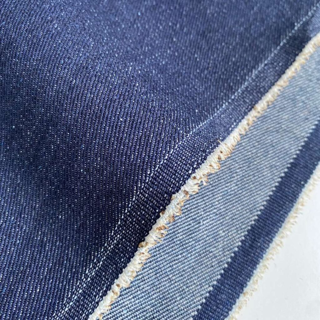 Unwashed, stiff denim that fades naturally over time for an authentic worn look.
