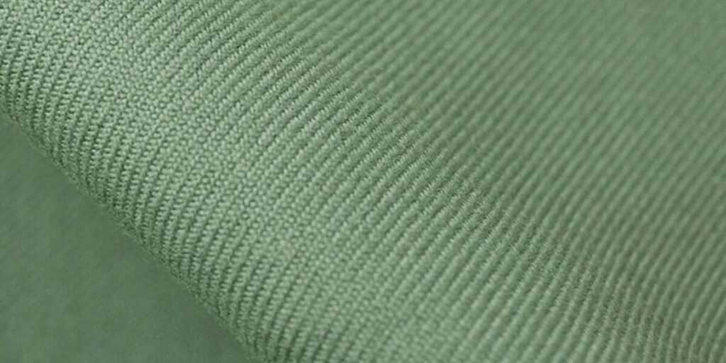 Classic streetwear fabric known for structure and texture. Perfect for workwear-inspired or utility jacket designs.