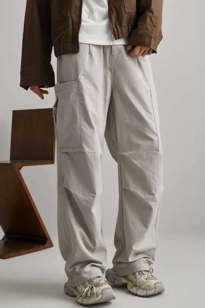 Relaxed fit utility cargo pants featuring a clean silhouette, lightweight woven fabric, and functional side cargo pockets. Designed for comfort, durability, and everyday wear.